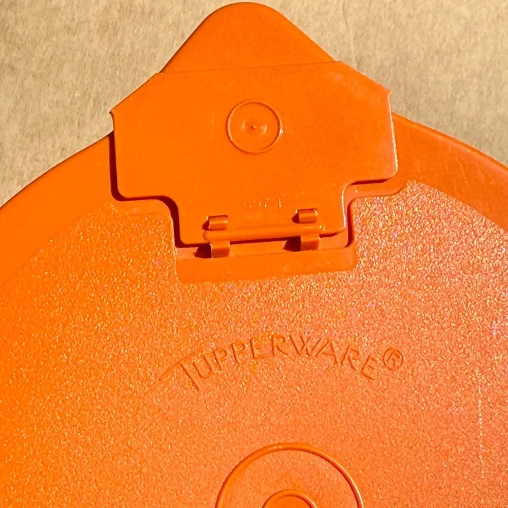 Vintage Tupperware Orange Lidded Measuring Cup